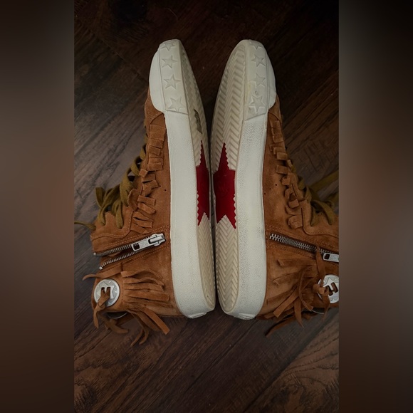 The sneakers are the ASH Marlow Fringe Lace Up High Top Sneakers. Size 38 - Picture 8 of 16